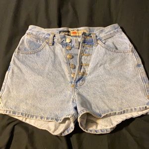 High waisted blue denim shorts.